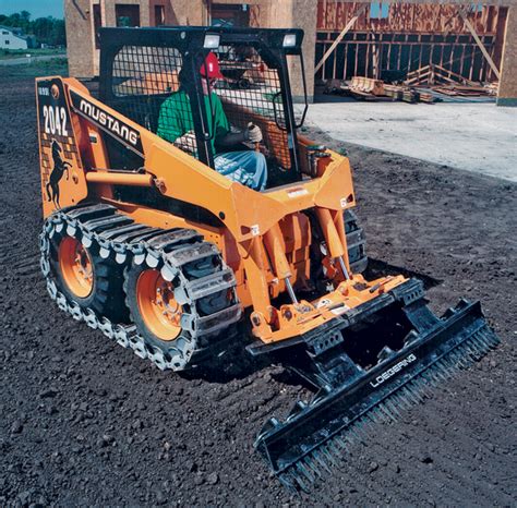 skid steer tracks vs tires